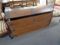 An antique oak metal bound shipping trunk