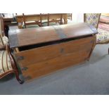 An antique oak metal bound shipping trunk