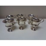 A near match set of six silver punch cups, dates various.