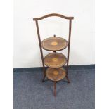 An Edwardian inlaid mahogany cake stand