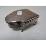 A silver ring box of raise feet bearing Birmingham hall marks