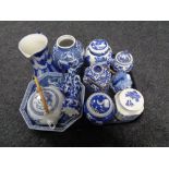 A tray of blue and white oriental style china including teapots, caddies,