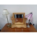 A pine toilet mirror together with a table lamp with glass shade and further lamp