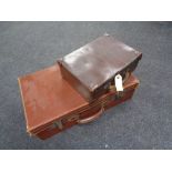 Two vintage leather luggage cases