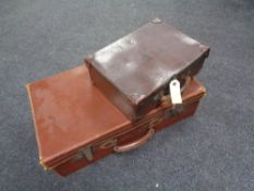 Two vintage leather luggage cases