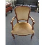 A beech framed salon chair in gold dralon