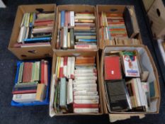 Five boxes and a crate of hardbacked and other books, novels,