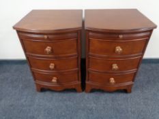 A pair of contemporary bow fronted three drawer bedside chests with slide