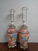 A pair of early 20th century Chinese floral pattern vases converted to table lamps on brass bases