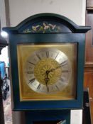 A 20th century hand painted longcase clock with brass dial