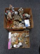 Two boxes of misc - pair of wall lights, fairy figures, tiger figures, Art Deco figures,