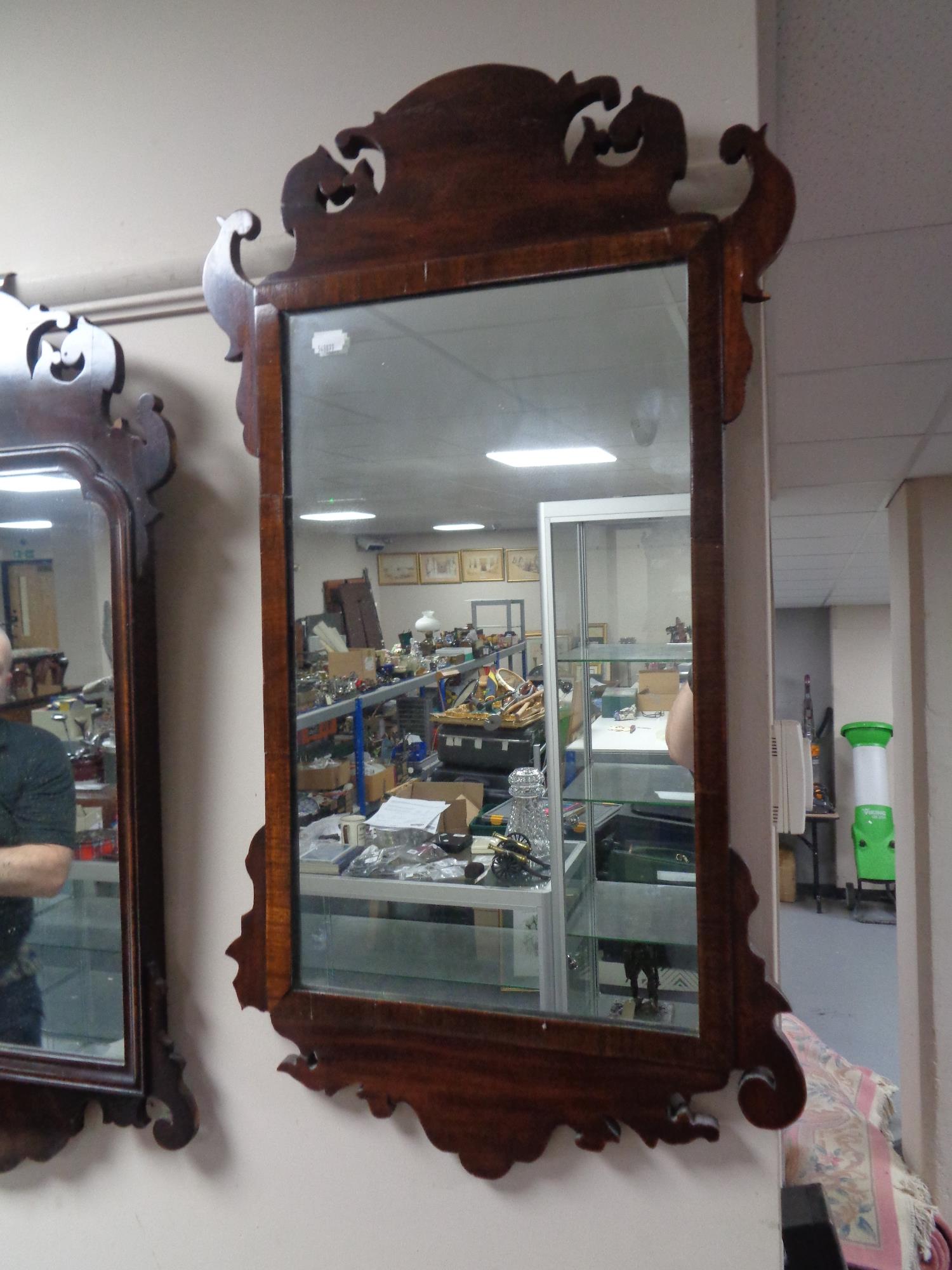 A Victorian mahogany Chippendale style wall mirror.