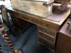 A late Victorian mahogany partners desk with inset leather panel