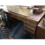 A late Victorian mahogany partners desk with inset leather panel