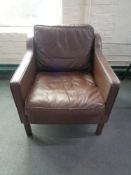 A mid 20th century Danish brown leather armchair