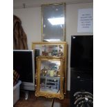 Three gilt framed mirrors