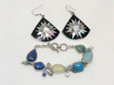 A silver hardstone bracelet and a pair of silver abalone earrings (3) CONDITION REPORT: