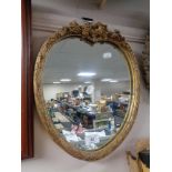 A Victorian composite frame heart shaped mirror.