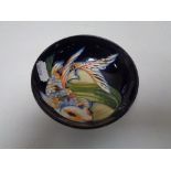 A Moorcroft shallow bowl, decorated with Koi carp on blue ground, width 11.5 cm.