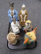 A tray of four oriental pottery figures, China rooster teapot,