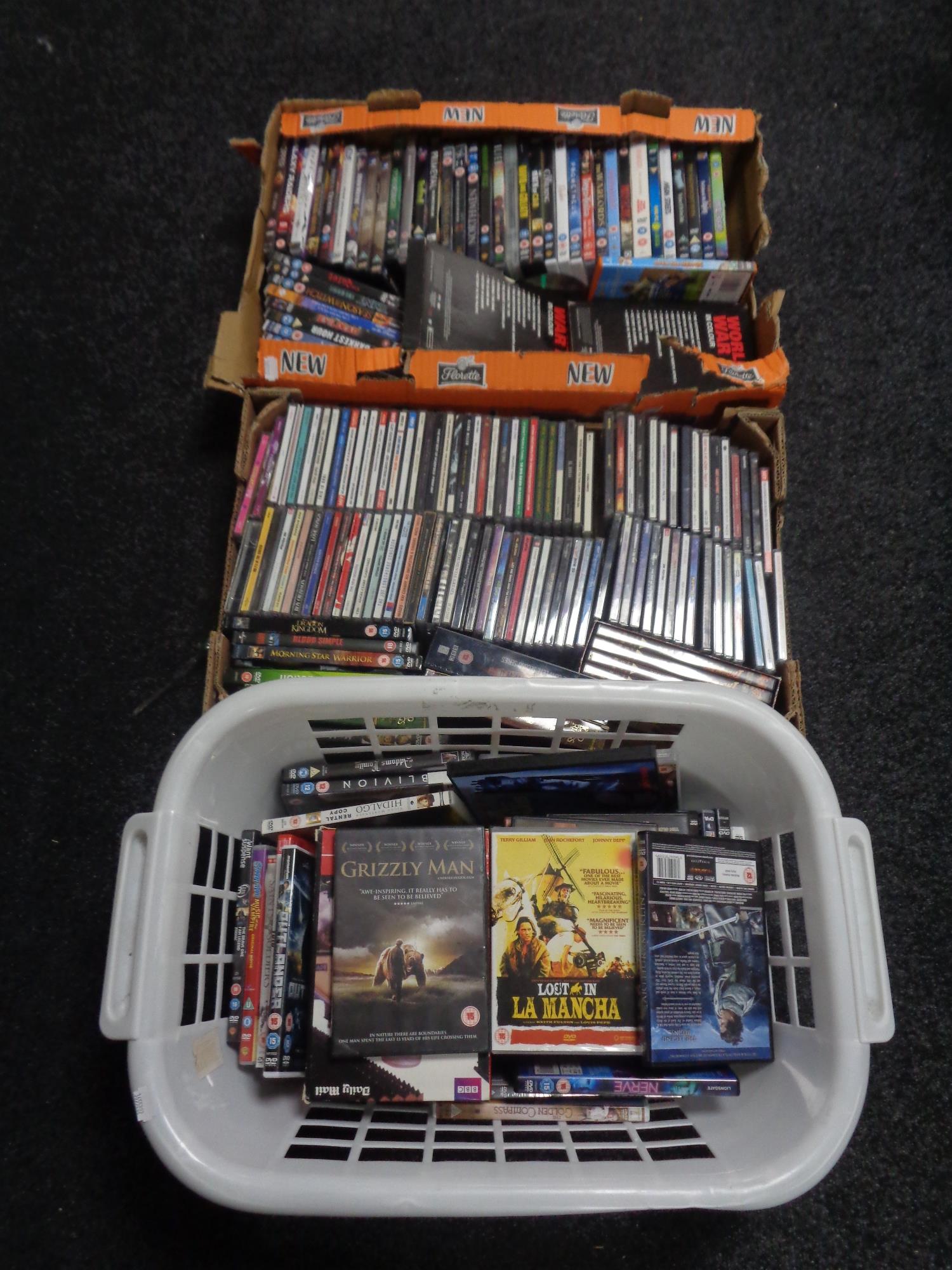 Six boxes of CDs and DVDs.