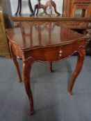 A 20th century shaped occasional table