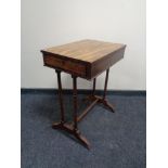A 19th century inlaid mahogany occasional table fitted a drawer
