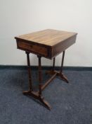 A 19th century inlaid mahogany occasional table fitted a drawer