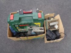 A box of cased and uncased power tools, Makita 9.