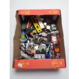 A box of playworn die cast vehicles,