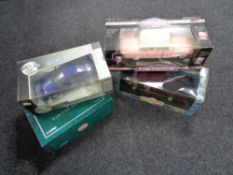 Four boxed large scale die cast vehicles : American muscle Ford etc