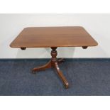 A Victorian mahogany tilt topped occasional table