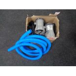 A box of best way swimming pool pumps and hoses