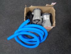 A box of best way swimming pool pumps and hoses