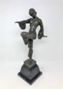 After D H Chiparus - A bronze dancing figure on marble stepped base, height 49 cm.