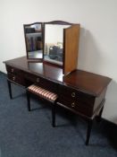 A Stag Minstrel dressing table with triple mirror and stool