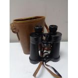 A set of Barr & Stroud binoculars in leather case. CONDITION REPORT: 19cm high.