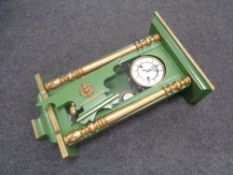 An early 20th century painted cased wall clock,