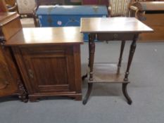 A 20th century oak occasional table and a cupboard