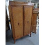 A 20th century mahogany double door cabinet