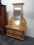 An early 20th century stripped pine dressing chest