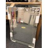 An all glass contemporary mirror,