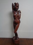 Carved hardwood Polynesian figure of a female nude