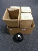 A box of four sets of Taylor miniature lawn bowls