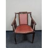 An Edwardian mahogany elbow chair