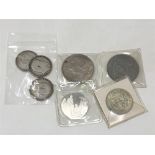 A Victorian crown 1889, US 1 dollar and half dollar coins,