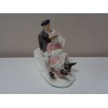 A Coalport figure, Winter Frolic,