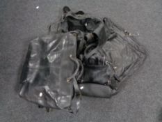 A box of leather suitbags and holdalls