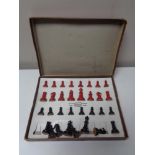 A set of boxed Britains chess pieces.