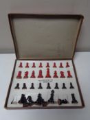 A set of boxed Britains chess pieces.